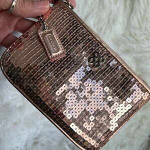 “✨ Sparkle with Style ✨ 
Rose Gold or Pink Sequin Wristlet (Coach-Inspired)”